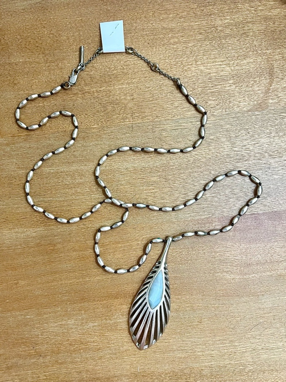 Silver-Tone Teardrop Pendant Necklace with Pale Blue Inlay